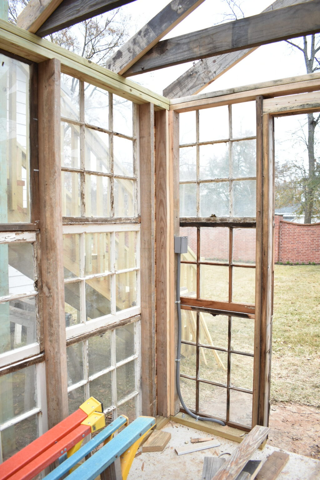How I Built My Greenhouse from Reclaimed Materials - Simply Southern